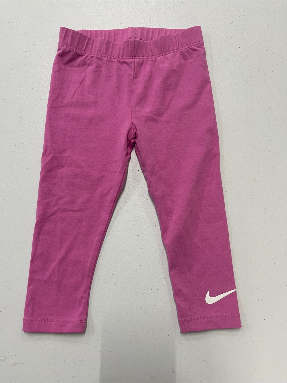 Nike Girls' Pink Athletic Leggings with White Swoosh